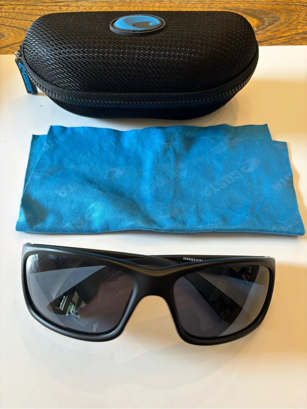 Costa Jose JO 01 Sunglasses in Black with Blue Zip Case Accent
